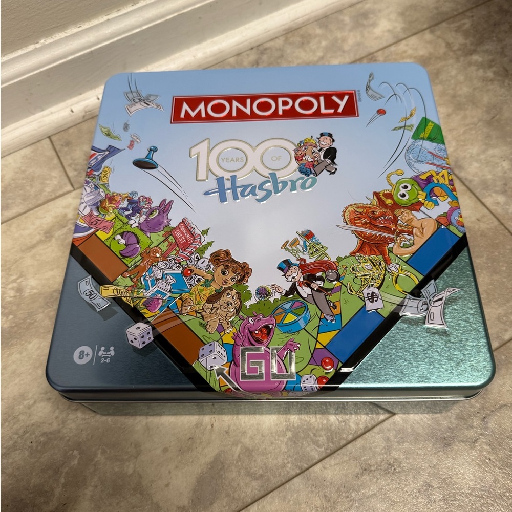 Hasbro Monopoly 10th Anniversary Tin with Colorful Design